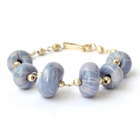 Handmade Bracelet having Disc Shaped Dark & Light Blue Color Beads