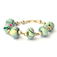 Handmade Bracelet having Alice Blue Beads with Multi-Color Stripes