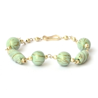 Handmade Bracelet having Alice Blue Beads with Silver Stripes