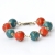 Handmade Bracelet having Red & Blue Beads with Metal Flowers