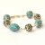 Handmade Bracelet having Blue Beads Studded with Metal Rings & Balls