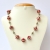 Red Handmade Necklace Studded with Pink + White Rhinestones