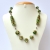 Green Handmade Necklace Studded with Metal Rings & Rhinestones