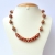 Handmade Red Necklace Studded with White & Orange Rhinestones