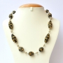 Handmade Necklace with Black Beads having Silver & Golden Flowers Handmade Necklace with Black Beads having Silver & Golden Flowers