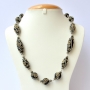 Handmade Necklace with Black Beads having Metal Rings & Chain Handmade Necklace with Black Beads having Metal Rings & Chain