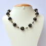 Handmade Necklace Studded with Black Beads having Metal Rings Handmade Necklace Studded with Black Beads having Metal Rings