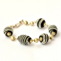 Handmade Bracelet having Black Beads Studded with Metal Chains