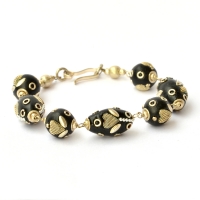 Handmade Bracelet having Black Beads Studded with Metal Hearts & Rings